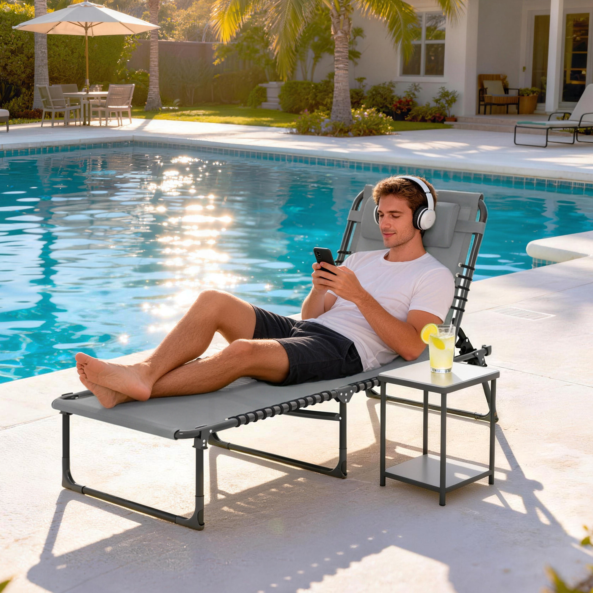 Bain de soleil transat pliable dossier inclinable multi-positions acier thermoplastique lacets élastiques noir textilène gris clair