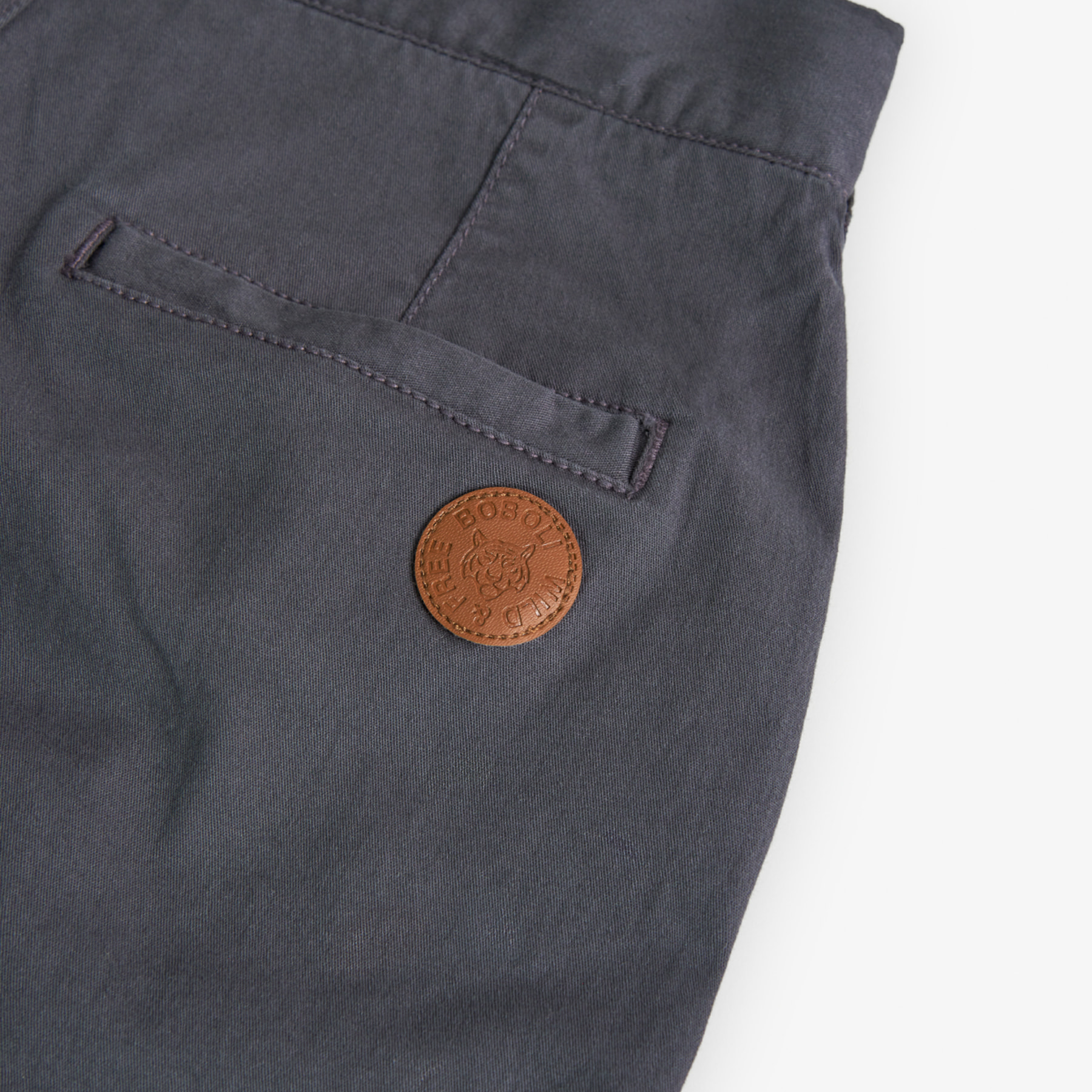 Bermudas para niÃ±o en algodÃ³n liso de color gris oscuro