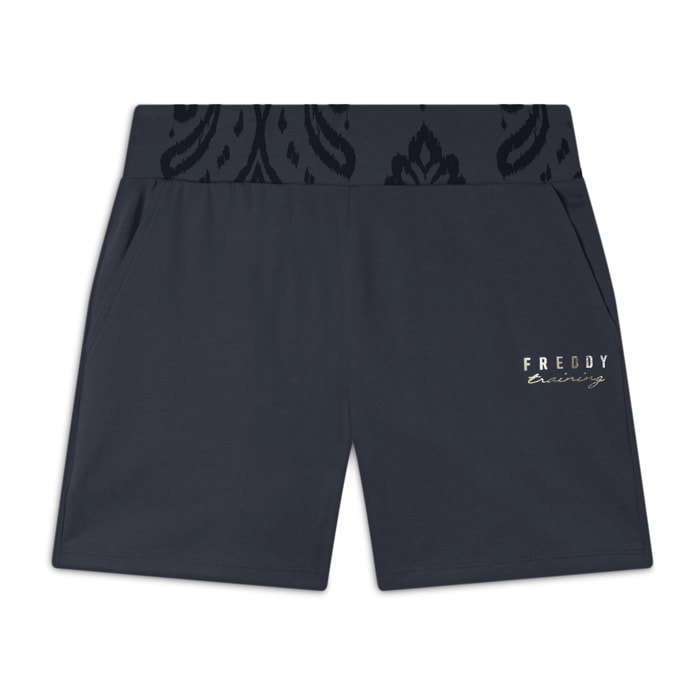 Short sportivi con fascia in vita floreale