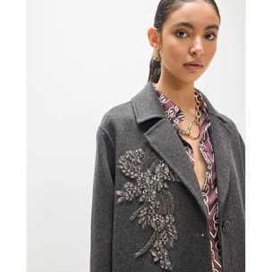 Cappotto in tessuto con decorazioni di strass sul petto
