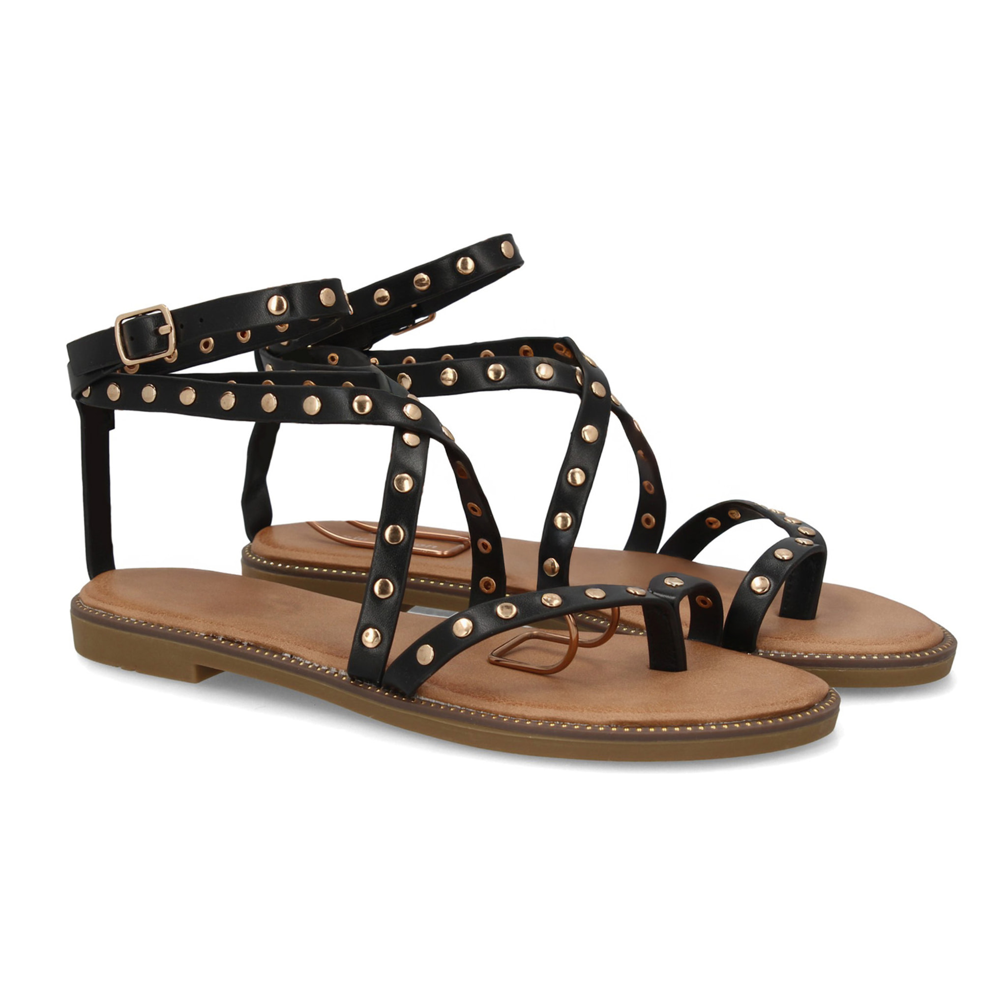 Sandalia plana con tiras y tachuelas para mujer.