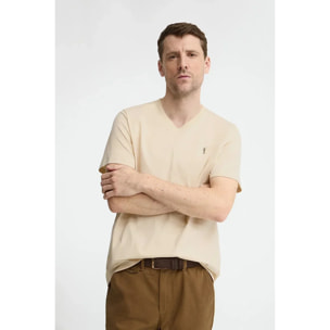 Camiseta color crema de cuello pico con logo Rigby Go