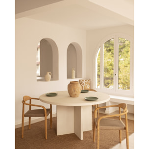 Table de salle à manger ronde en microciment de teinte blanc cassé disponible en différentes tailles
