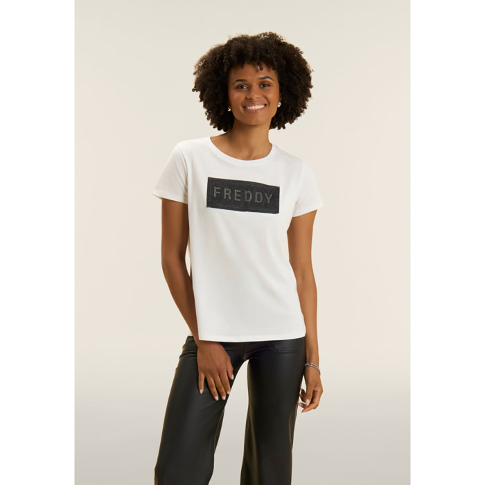 T-shirt con strass e inserto in mesh