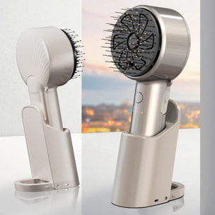 Pettine atomizzatore con massaggio a due velocità e base.