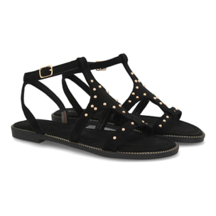 Sandalia plana elegante mujer tachuelas