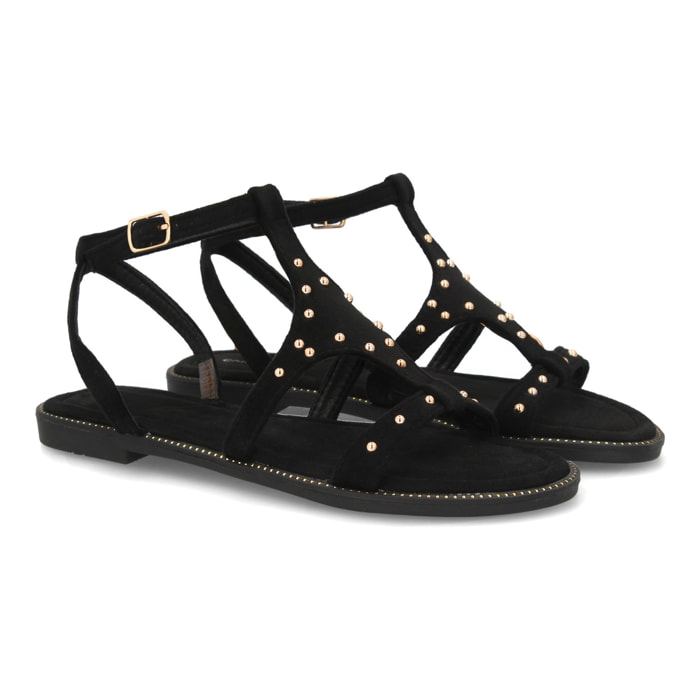 Sandalia plana elegante mujer tachuelas