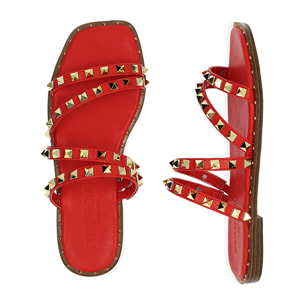 Sandalias planas rojas con tachuelas