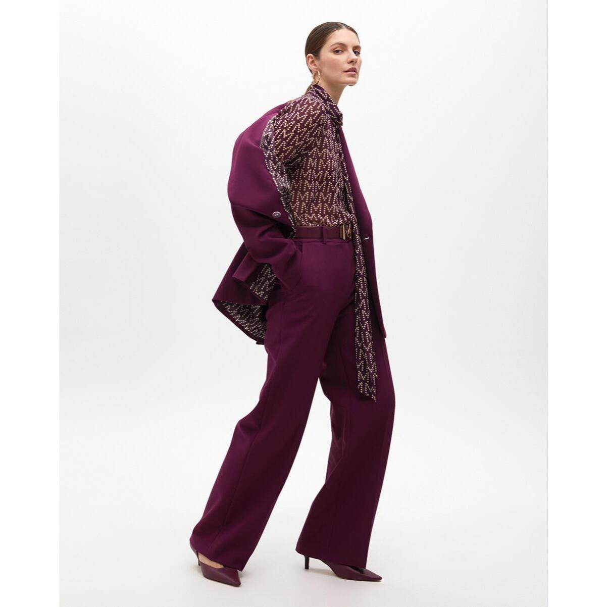 Camicia con logo e fiocco al collo