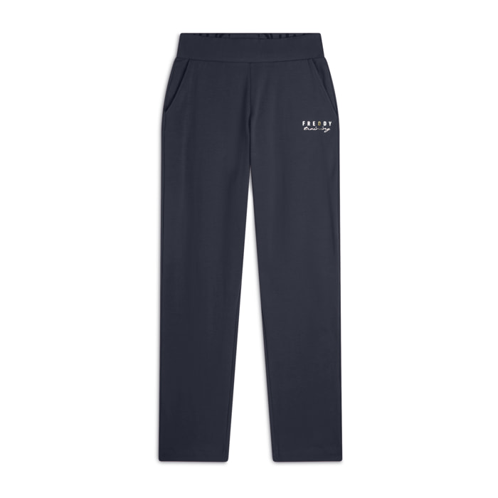 Pantaloni regular fit con fondo dritto con piccoli spacchi