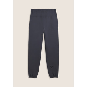 Pantaloni slim in interlock con dettagli lucidi