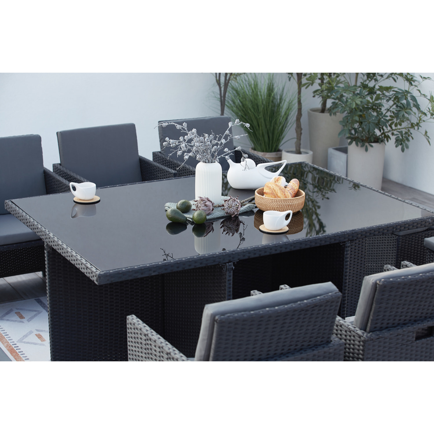 Table et chaises 10 places encastrables en résine noir/gris DALMA