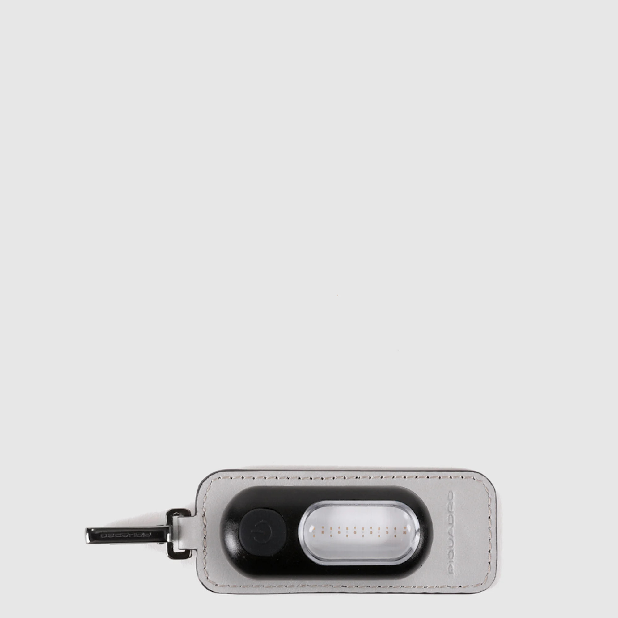 Piquadro Address tag in pelle con torcia