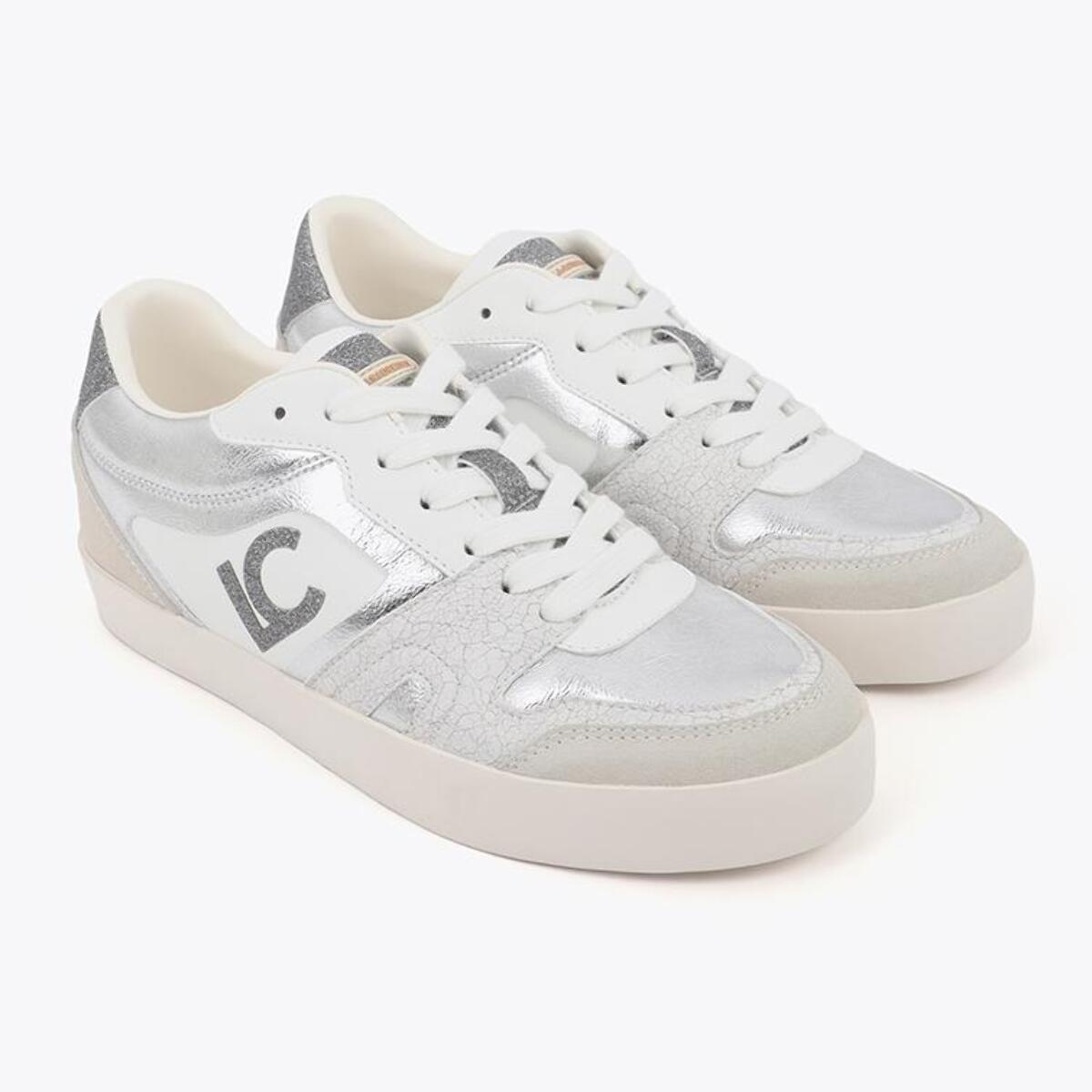 Scarpa sportiva con zeppa interna in tessuti abbinati e dettagli in pelle