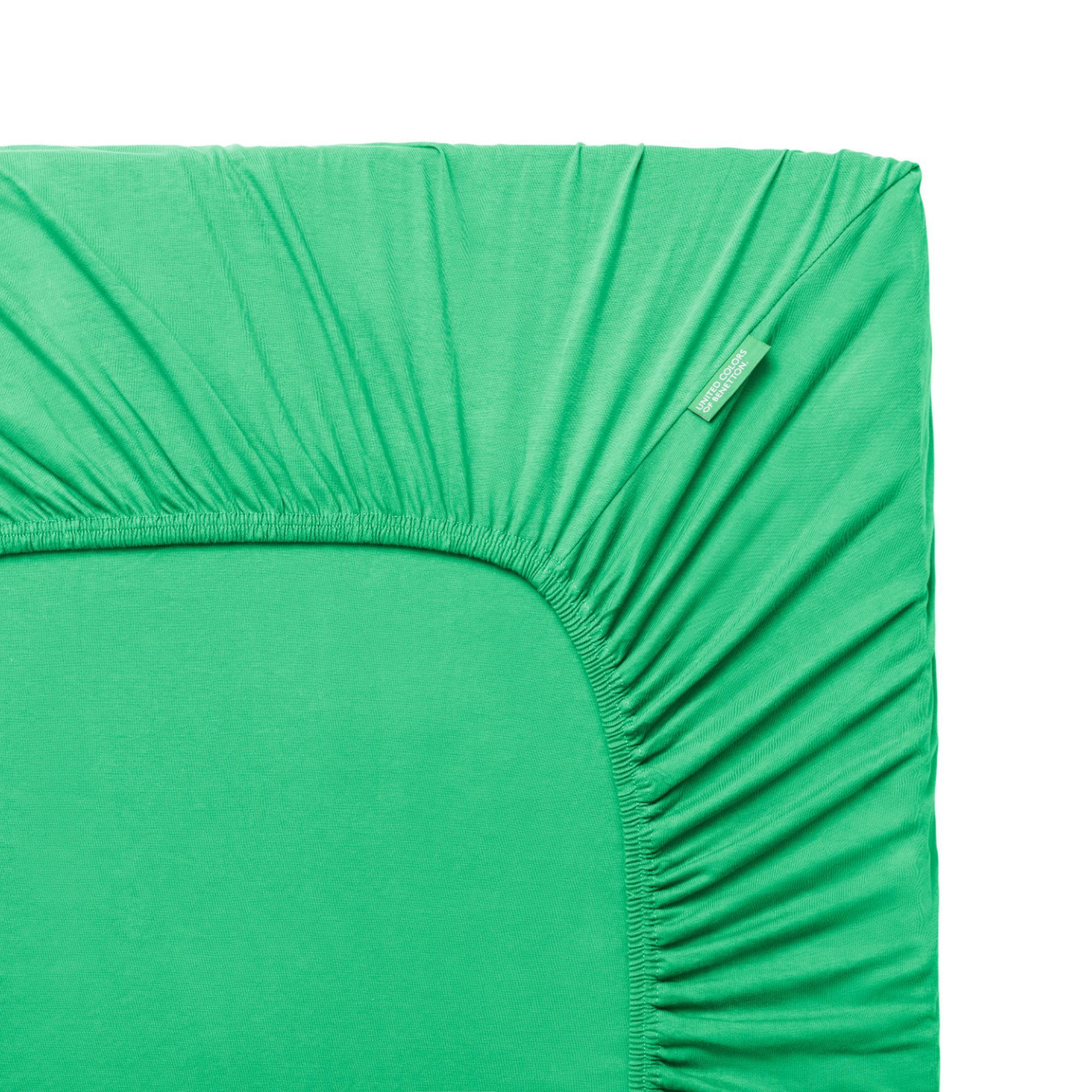 Sábana bajera 90-100x200cm en color verde 100% algodón rainbow benetton