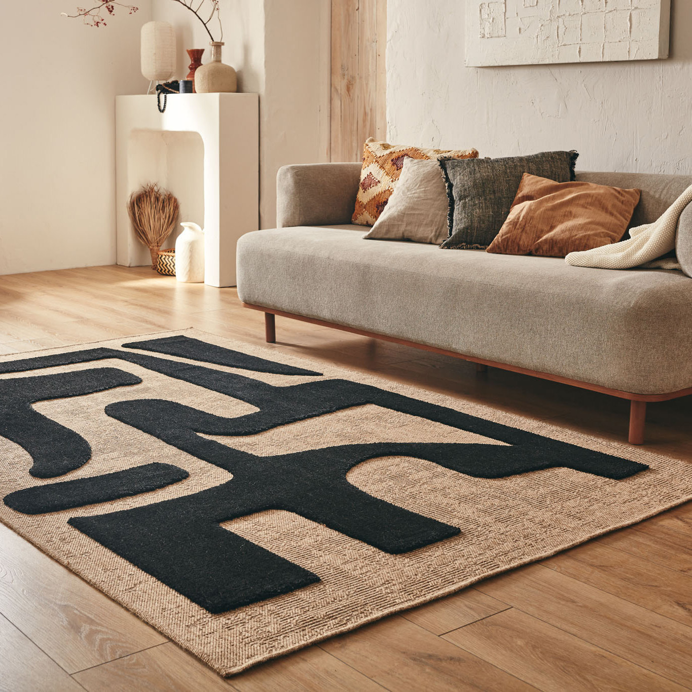 PALMA - Tapis aspect jute à motif abstrait en relief - Noir