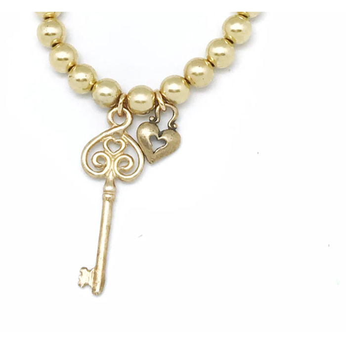 Pulsera candado y llave Love . Dorado elástica.