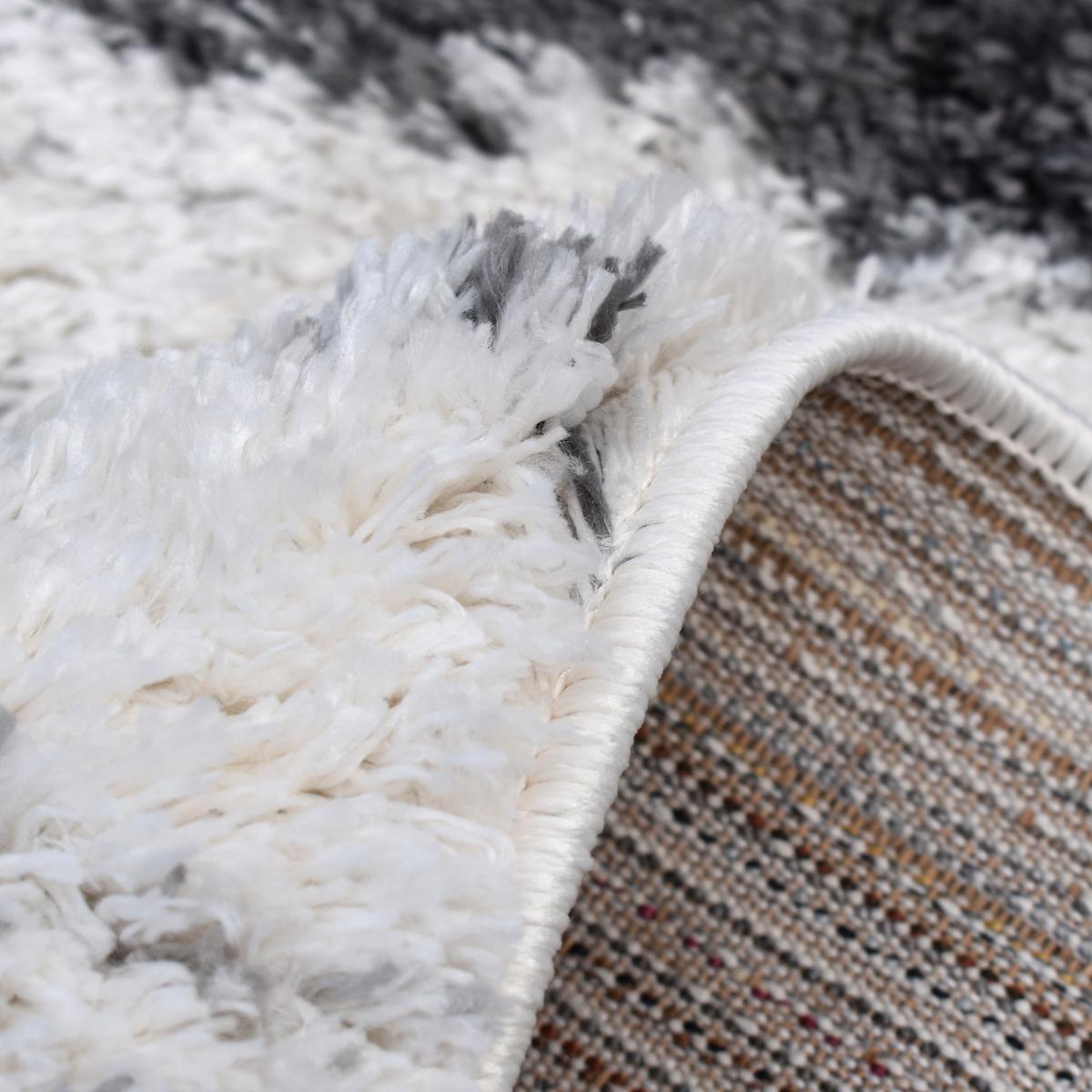 Tapis Shaggy longues mêches et aux motifs abstraits