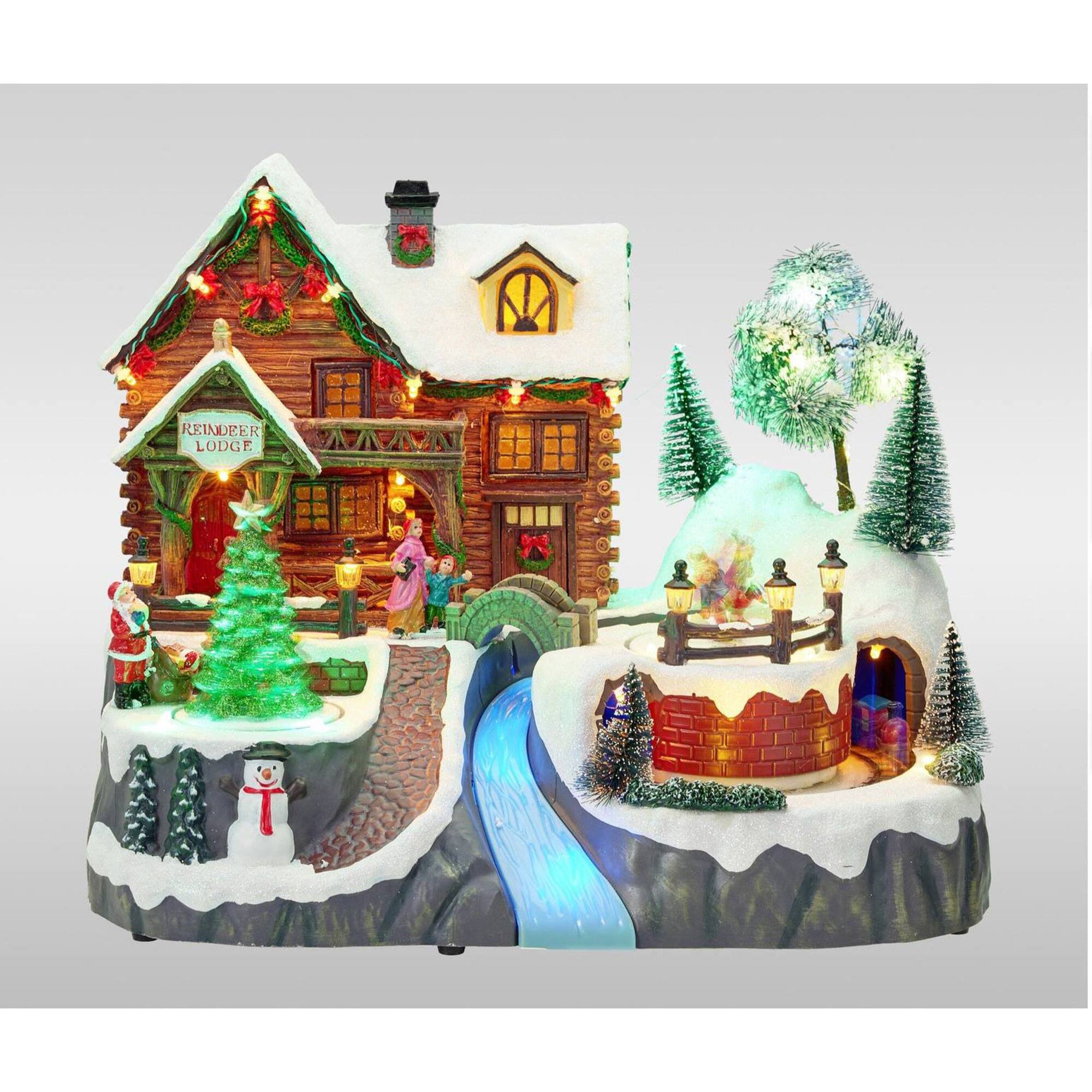 Pueblo navideño con tren, luces led, movimiento y música, usb o pilas 35x24,5x28,5 cm