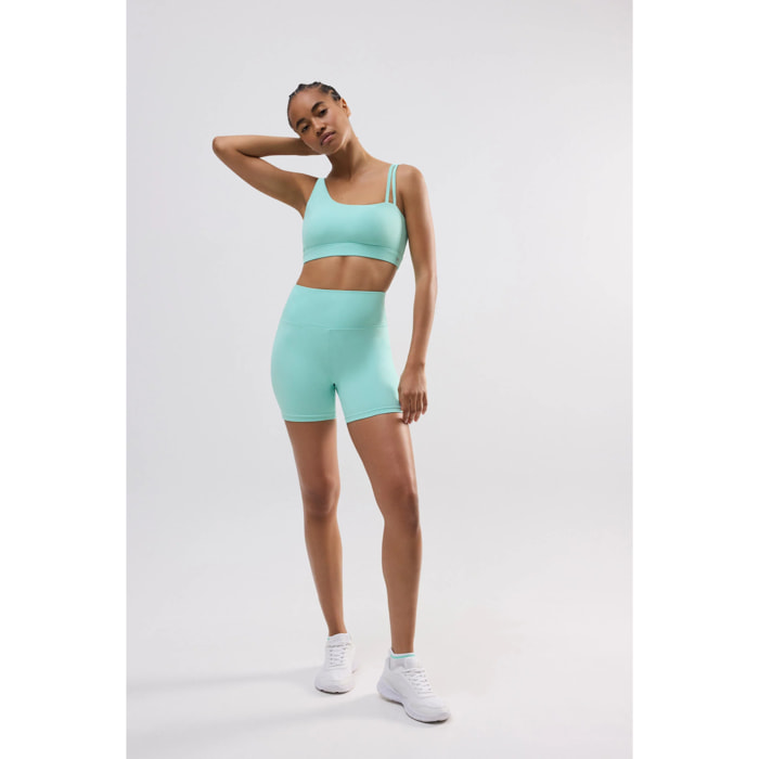 Reggiseno sportivo asimmetrico con supporto leggero in azzurro