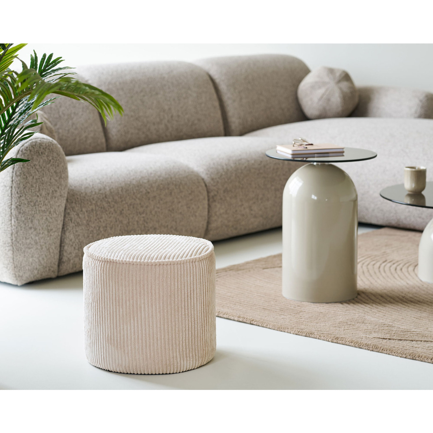 Pouf Taupo in velluto a coste beige ø40×35 cm