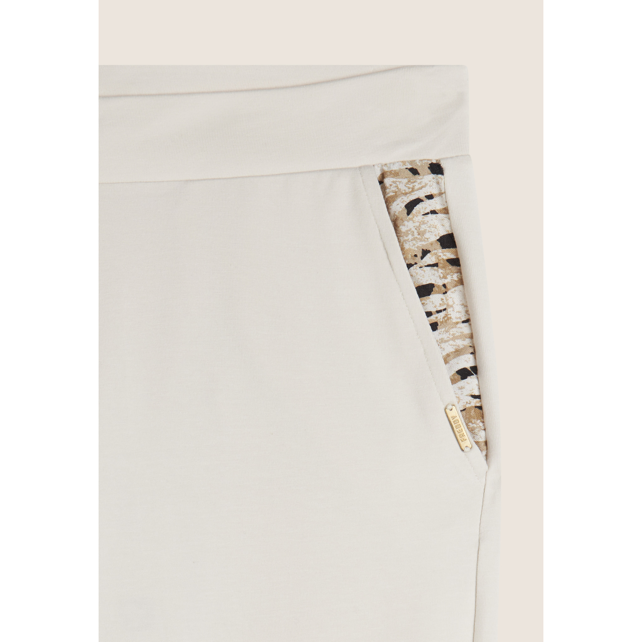 Pantaloni in jersey con apertura tasche animalier