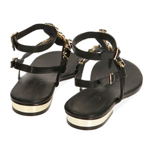 Sandalias planas con pedreria negras