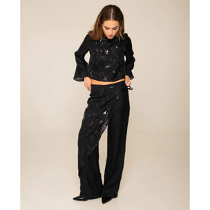 Pantalón con bordado y lentejuelas con capa superpuesta de mujer