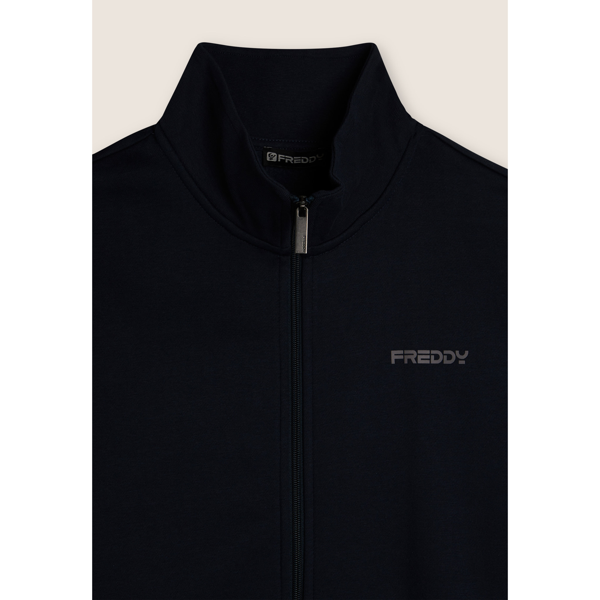 Tuta full zip in felpa garzata con collo alto e gamba dritta