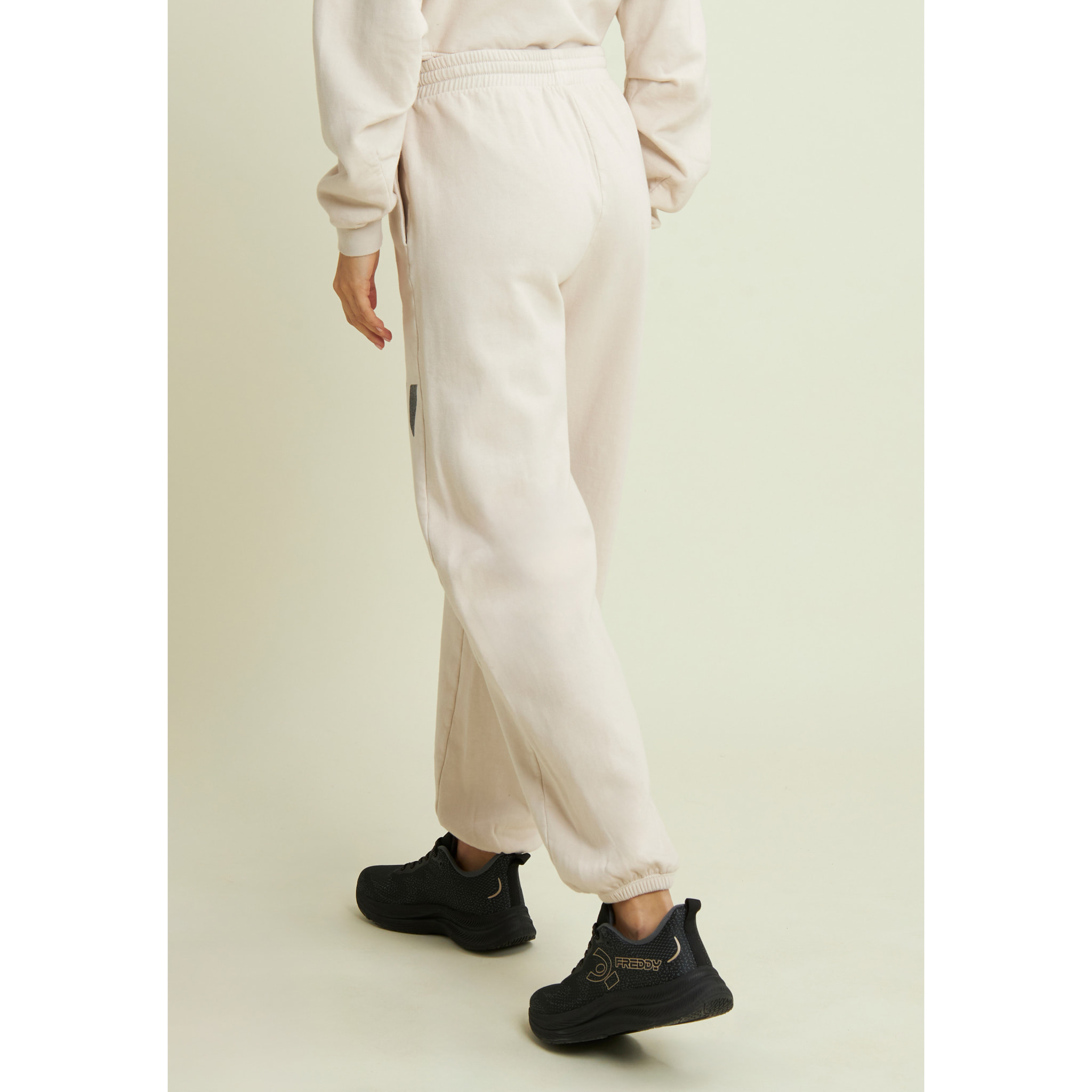 Pantaloni in felpa con stampa Flow e fondo raccolto