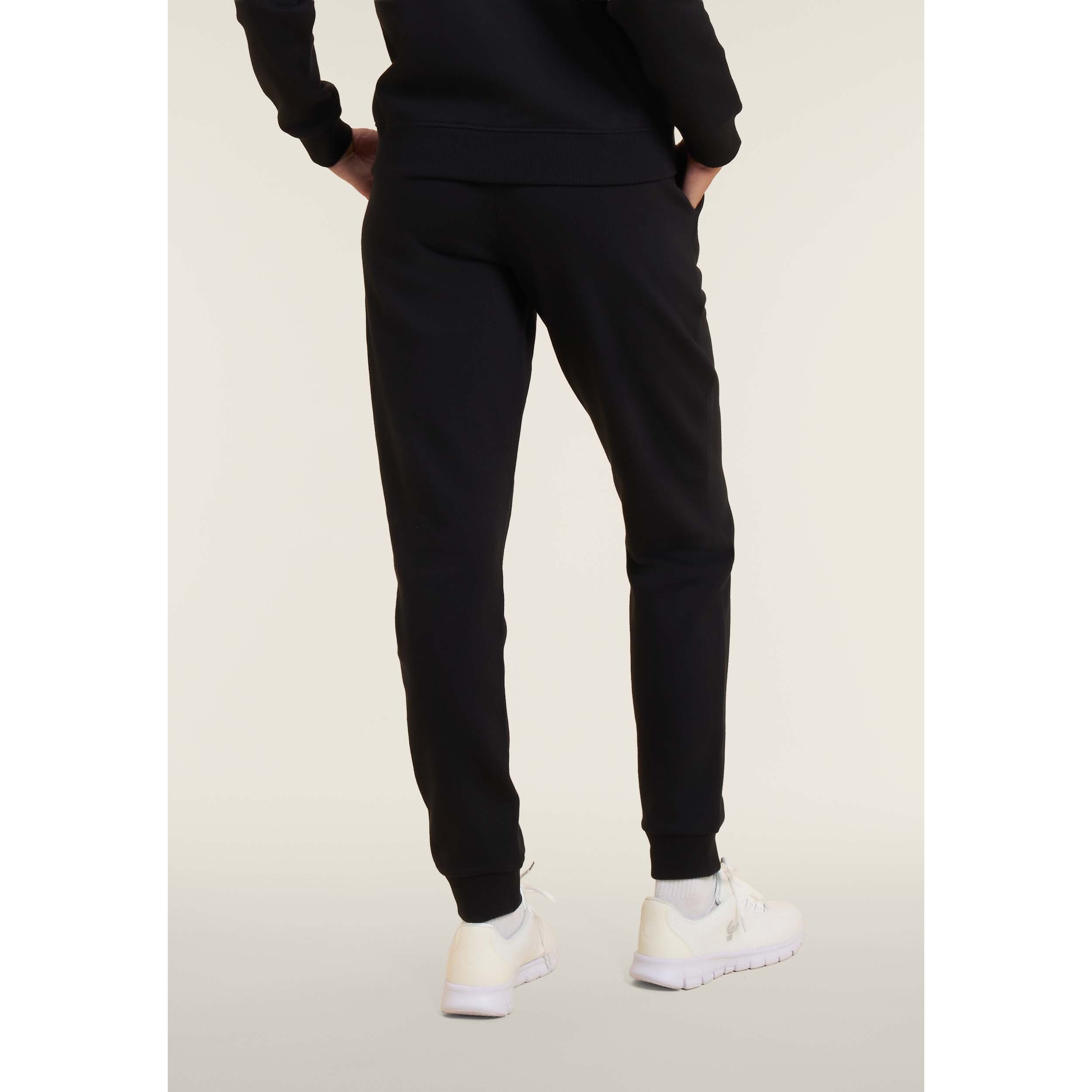 Tuta con zip e collo alto decorata da inserti animalier