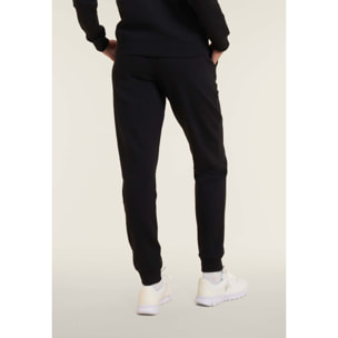 Tuta con zip e collo alto decorata da inserti animalier