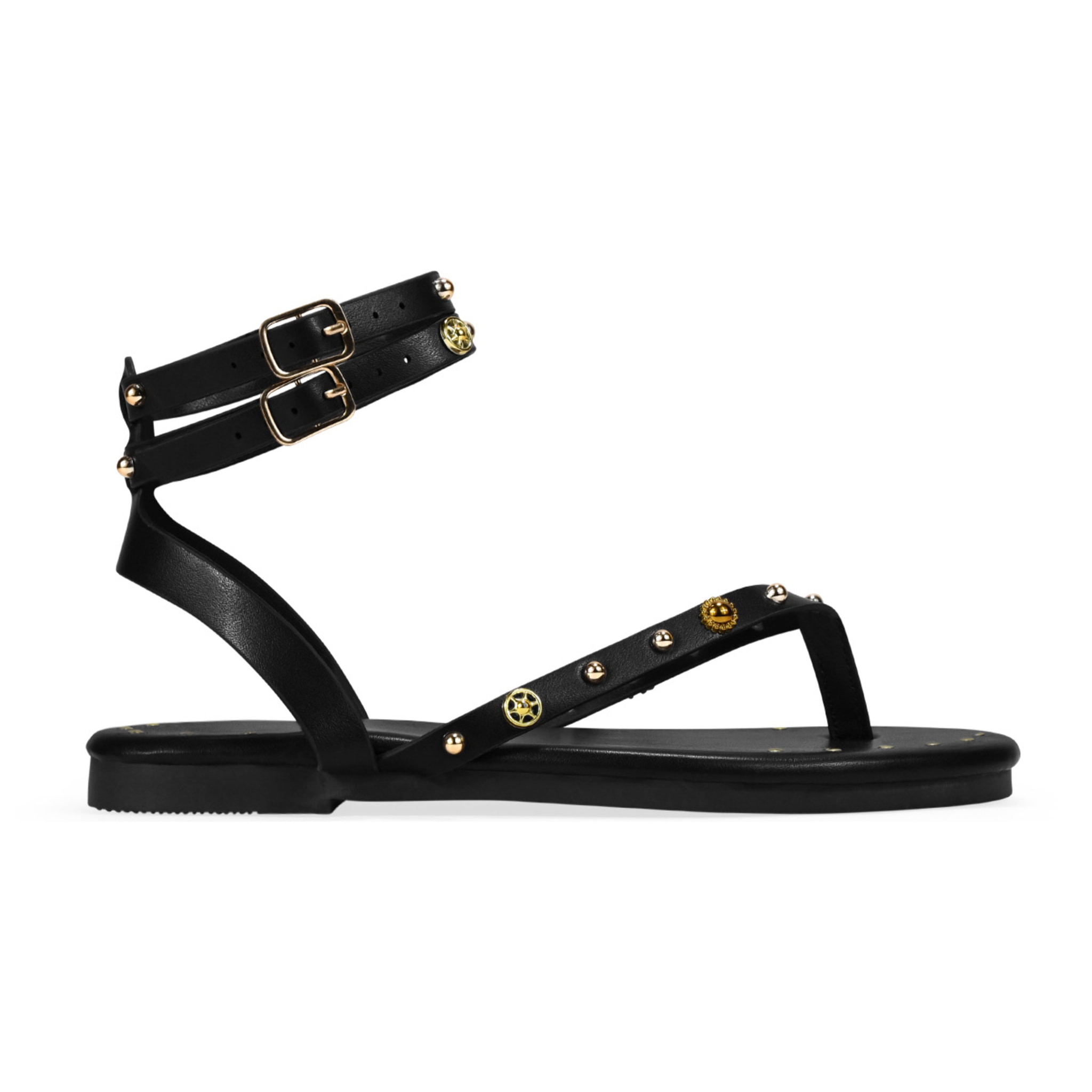 Sandalias planas negras con tachuelas y doble pulsera