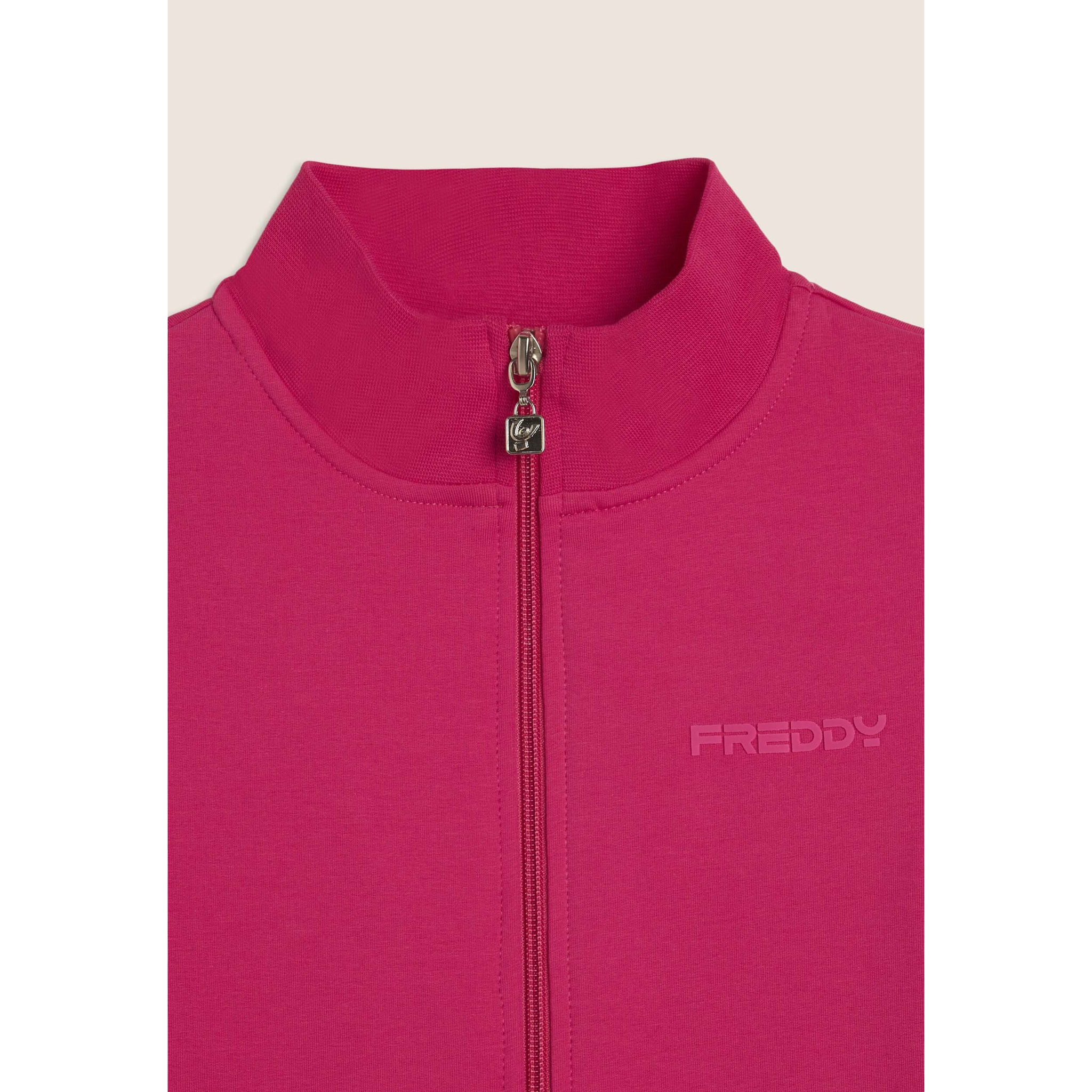 Tuta Junior full-zip con collo alto e tasche a marsupio