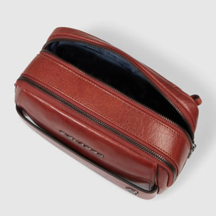 Piquadro Pochette in pelle con polsiera rimovibile e protezione RFID