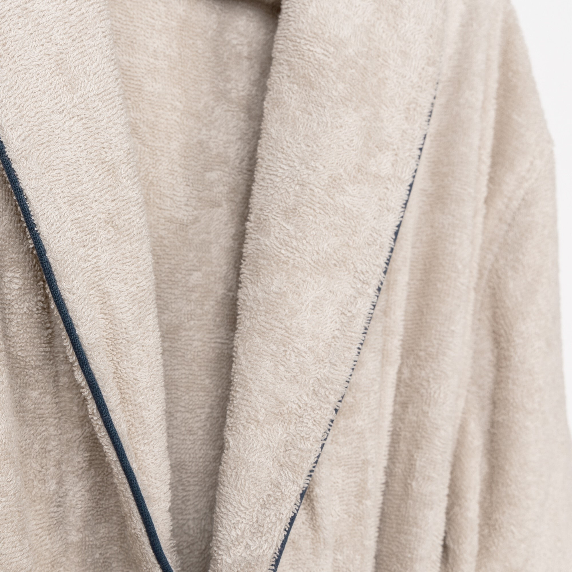 Scalpers Albornoz liso con ribete y detalle bordado beige