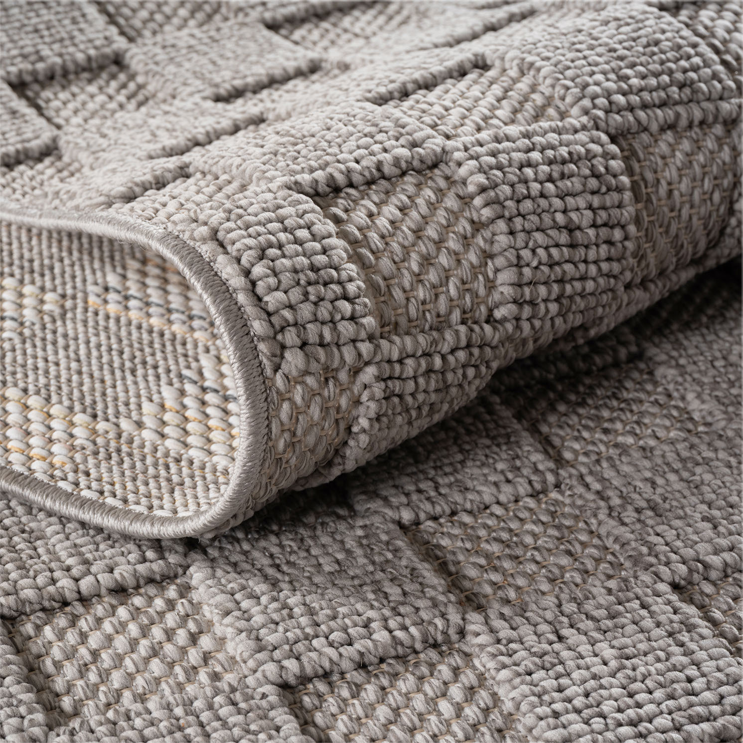 HELIX - Tapis moderne effet laine bouclé à motif damier en relief gris