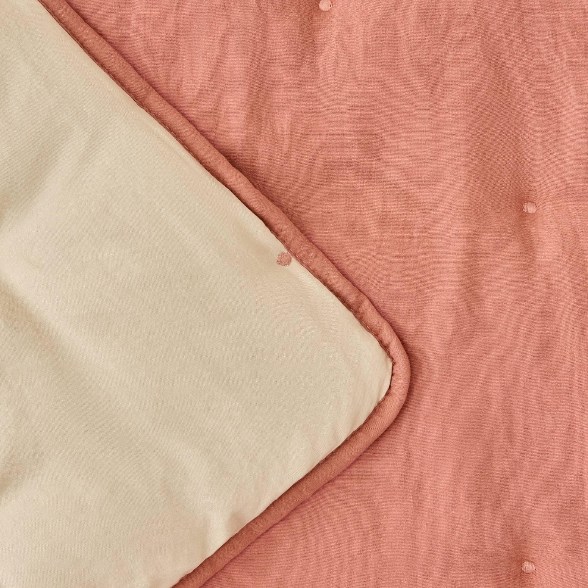 Topper reversible acolchado Rustcol color rosa empolvado Poliéster