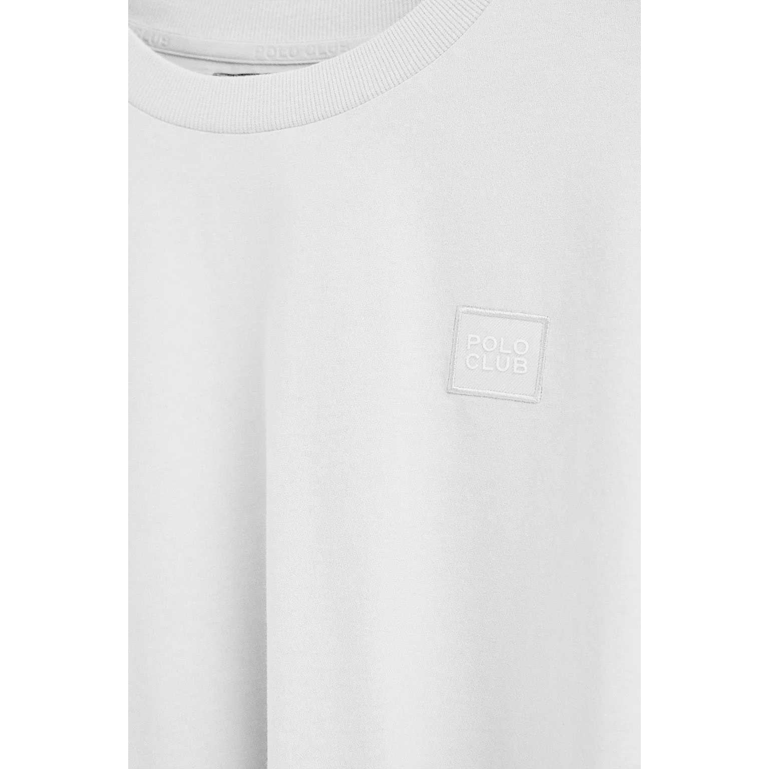 Camiseta blanca holgada con detalle Polo Club