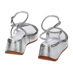 Cuñas plateadas laminadas con piedras