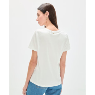 T-shirt con stampa animalier e palme