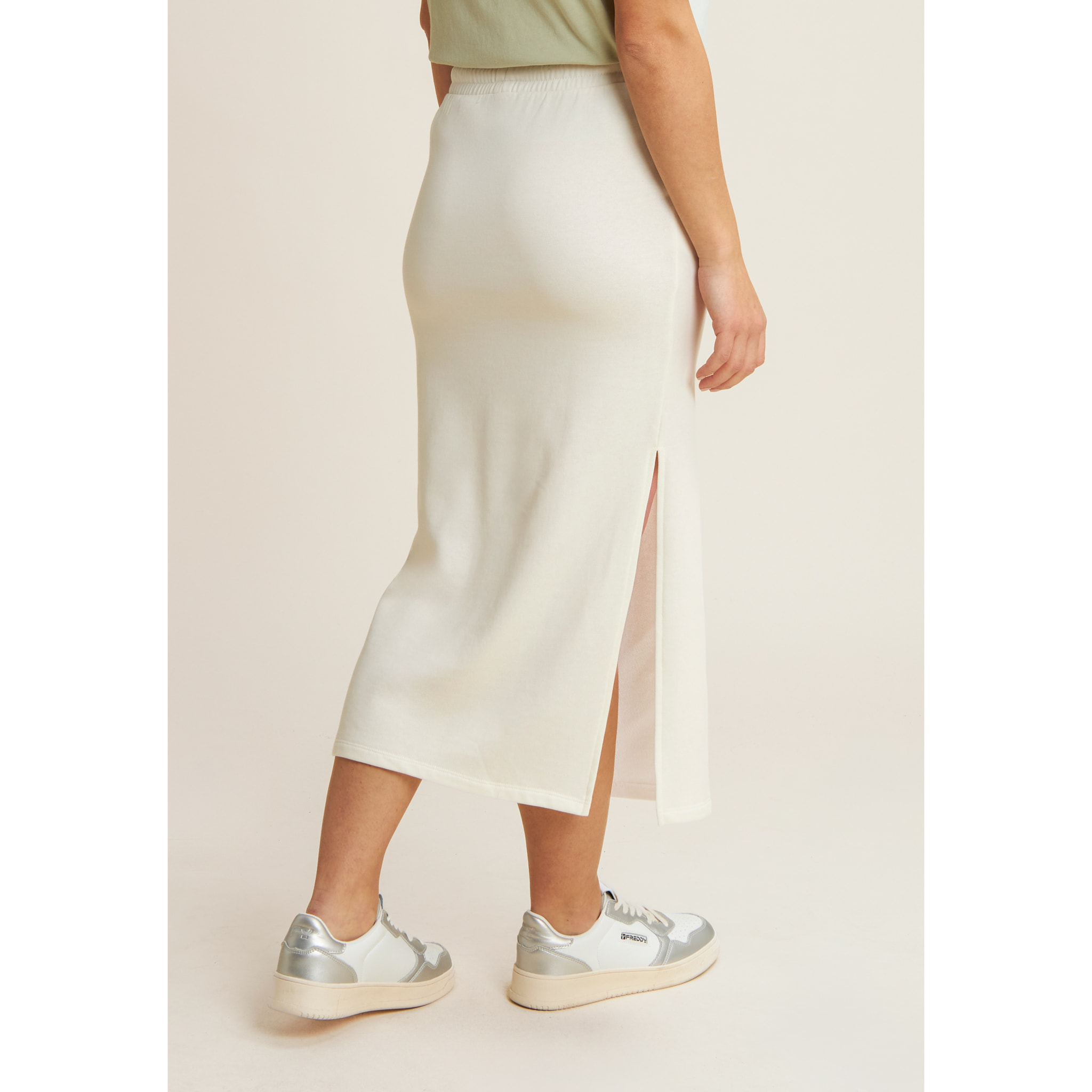 Gonna longuette con spacchi laterali e maxi tasca