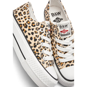 Sneakers basse con plateau e stampa leopardata