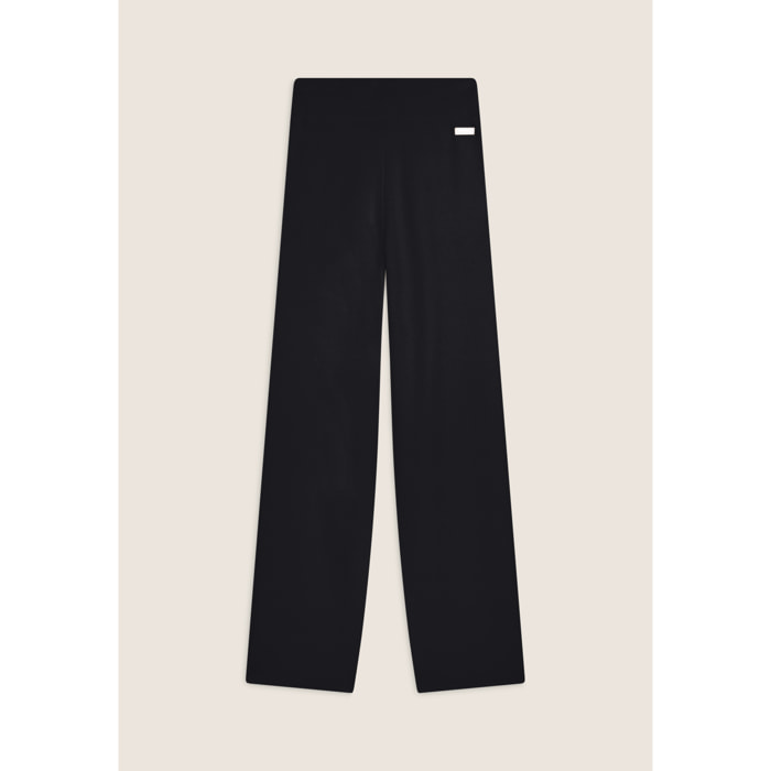 Pantalone in maglia tricot rasata con gamba larga