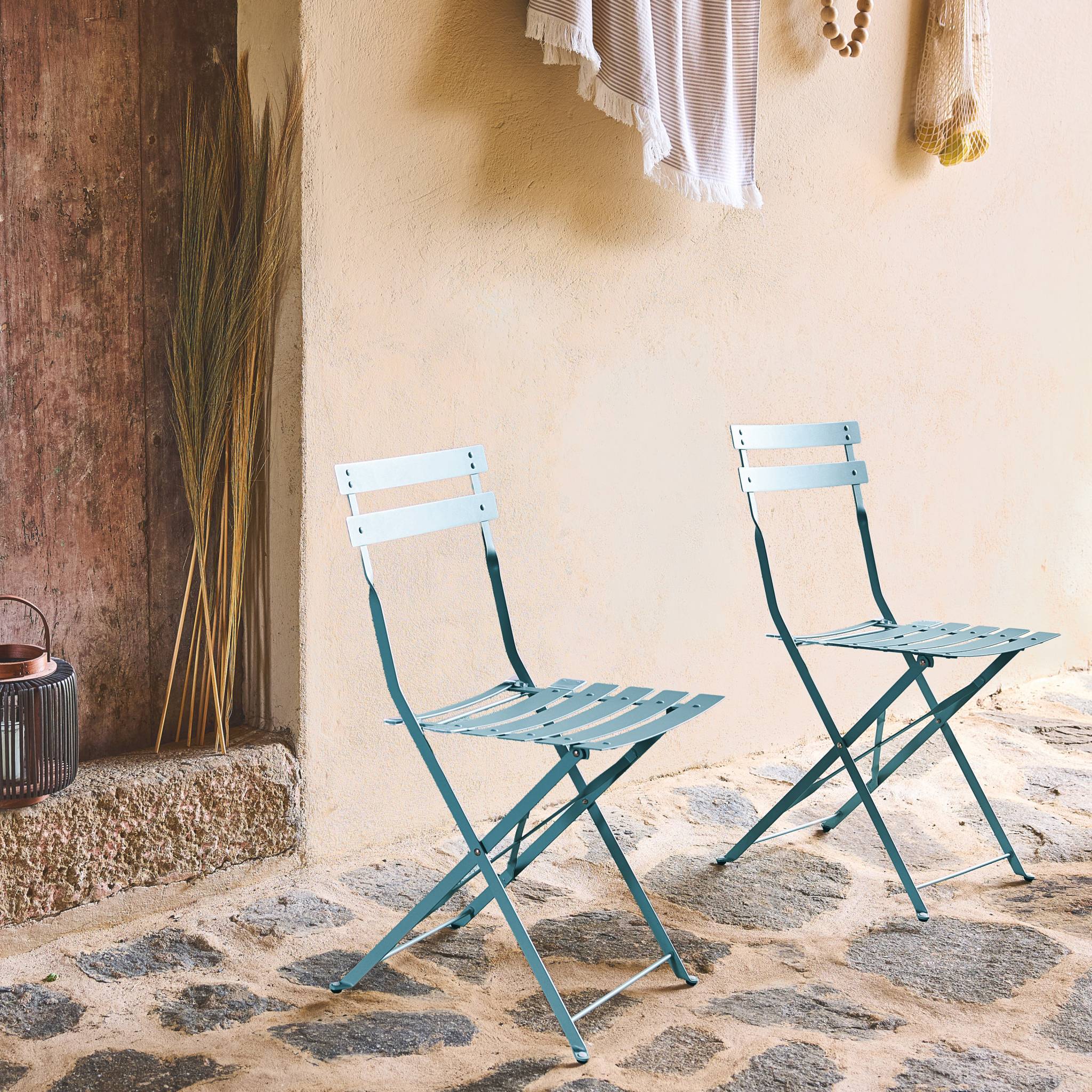 Lot de 2 chaises de jardin bistrot pliables en acier thermolaqué. 49.5 x 41 x 80.5cm