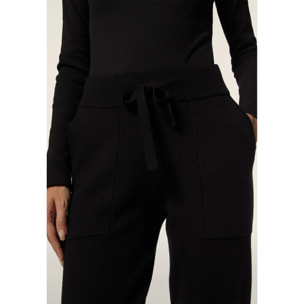 Pantalone in maglia tricot rasata con polsini e vita a coste