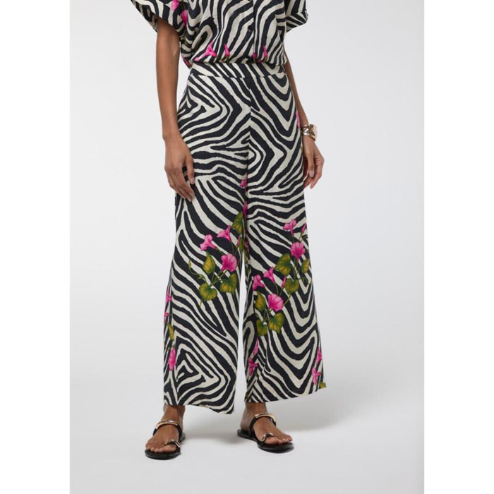 Pantaloni con stampa zebra e fiori