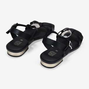 Sandalias planas negras en piel con aplique metálico