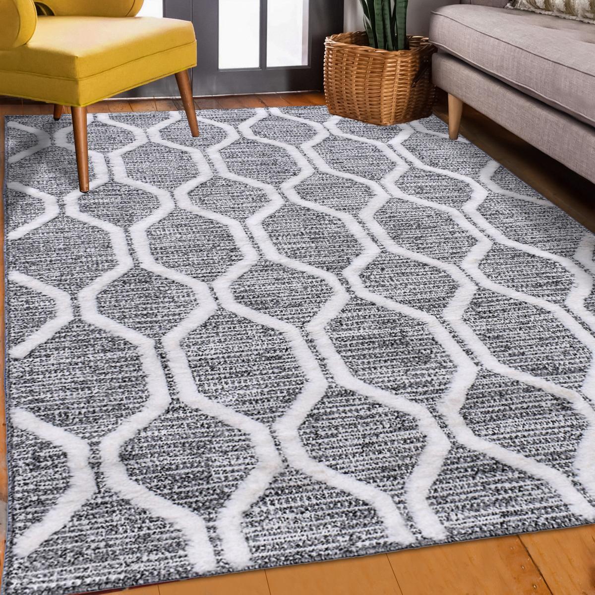 Tapis Turi en relief dessin géométrique, couleur gris et blanc