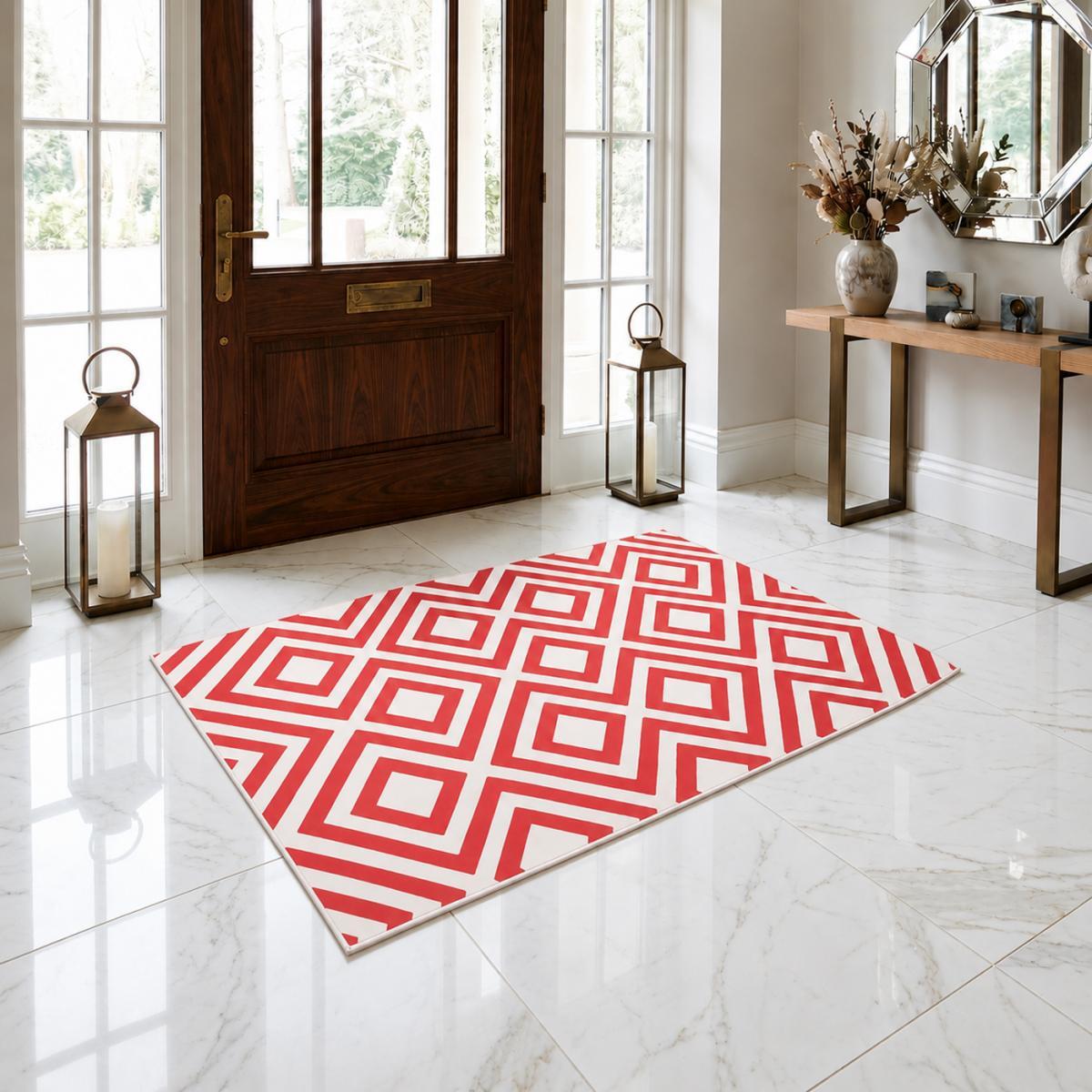 Petit tapis Begja rouge et blanc aux motifs géométriques scandinaves